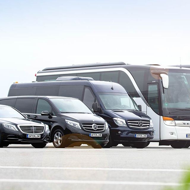 Limousines, Minivans and Coaches on a runway.